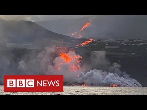 Toxic gas fear as Spanish volcano lava reaches ocean – BBC News
