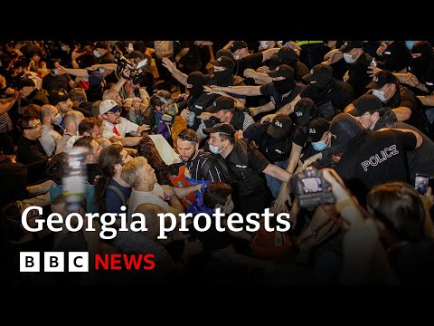 Georgia: Protesters hit by police water cannons after passing of ‘Russian inspired’ bill | BBC News