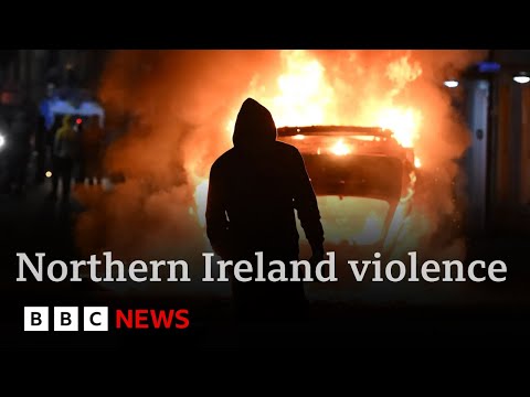 Anti-migrant riots spread in Northern Ireland as mobs attack police | BBC News