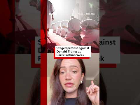 Staged protest against US President Donald Trump at Paris Fashion Week. #BBCNews