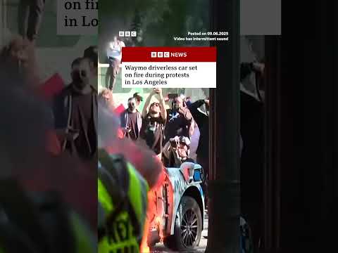 LA protests: Waymo driverless car set on fire. #LA #Protest #Shorts #BBCNews