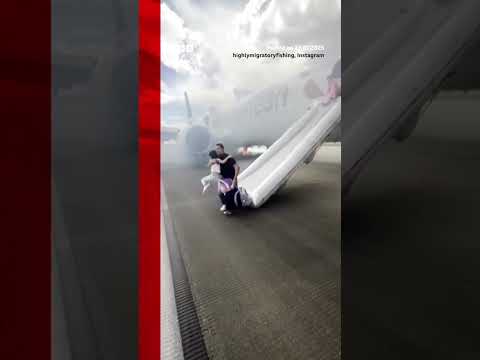 Passengers use emergency slides to flee plane fire at Denver airport. #Denver #BBCNews