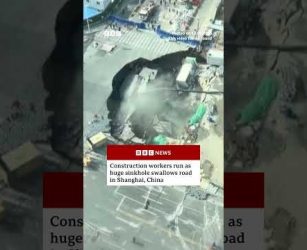 Construction workers run as huge sinkhole swallows road in Shanghai, China. #BBCNews