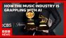 Grammys boss warns about the 'threat' of AI music | BBC News