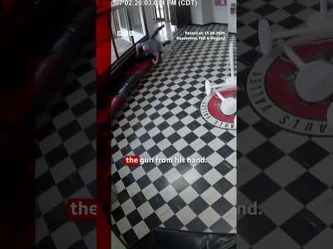 Moment gunman tackled by school principal in Oklahoma. #Oklahoma #CCTV #School #BBCNews