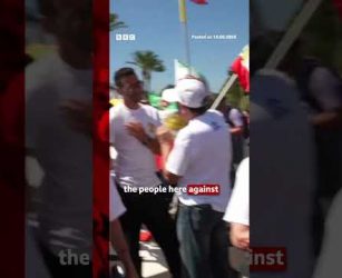 Iranian-Americans protest against Iran team at World Cup. #WorldCup #BBCNews