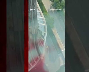 Debris falls after plane hits Beijing's tallest building. #BBCNews