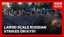 At least 13 killed in large-scale Russian missile and drone strikes on Kyiv | BBC News